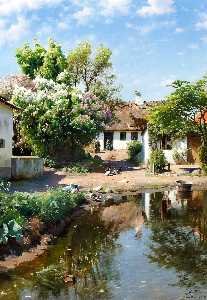 Peder Mork Monsted - Spring day at a thatched house with blooming lilacs