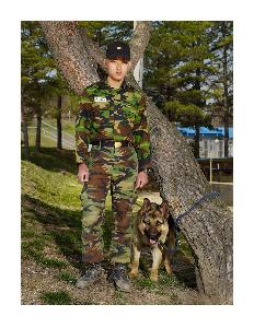 Oh, Hein-Kuhn - An army dog, “Adol,” and a private, April 2010
