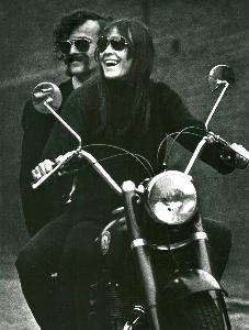 Jürgen Hebestreit - Laughing couple (Jürgen Klauke and Hannelore Wiese) on a motorcycle