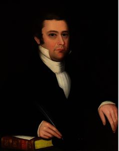 Ammi Phillips - PORTRAIT OF A DARK-HAIRED GENTLEMAN WITH PEN AND BIBLE