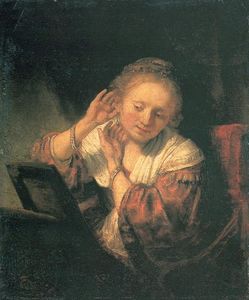 Rembrandt Van Rijn - Young Woman at a Mirror